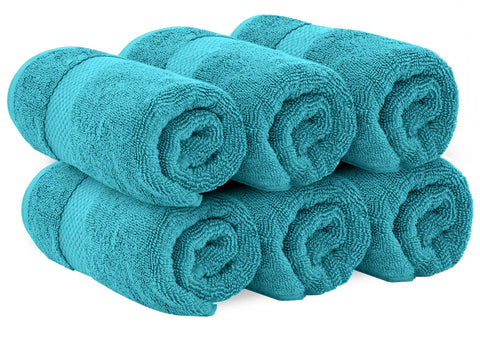 White Classic absorbent towels designed to dry quickly after shower or swim.