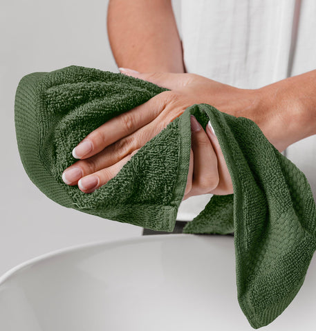 White Classic forest green washcloth on tile, ideal bath accessory