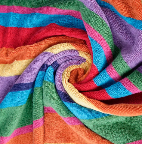 White Classic four-pack travel towels, compact and packable for trips.