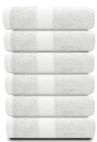 White Classic hotel collection hand towels absorbent weave close-up for spa-like bathrooms.