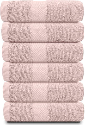 White Classic six-piece pink towel set arranged for hotel-style display.