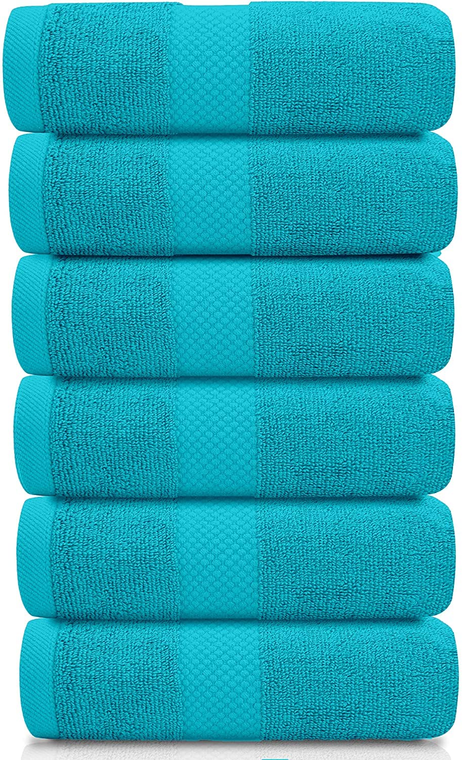 White Classic Hotel Collection towels neatly folded for a spa-like bathroom.
