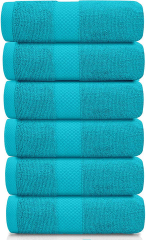 White Classic Hotel Collection towels neatly folded for a spa-like bathroom.