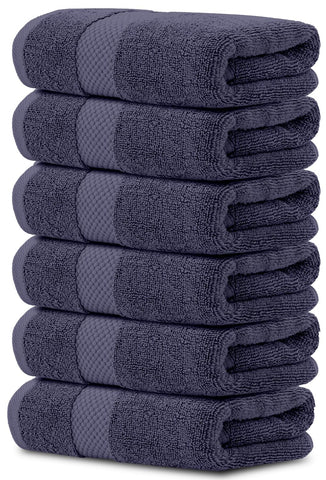 White Classic navy blue hand towel close-up showing plush pile and absorbency.