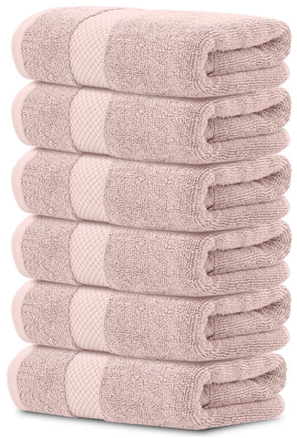 White Classic pink towel close-up, plush Turkish cotton for spa-like softness.