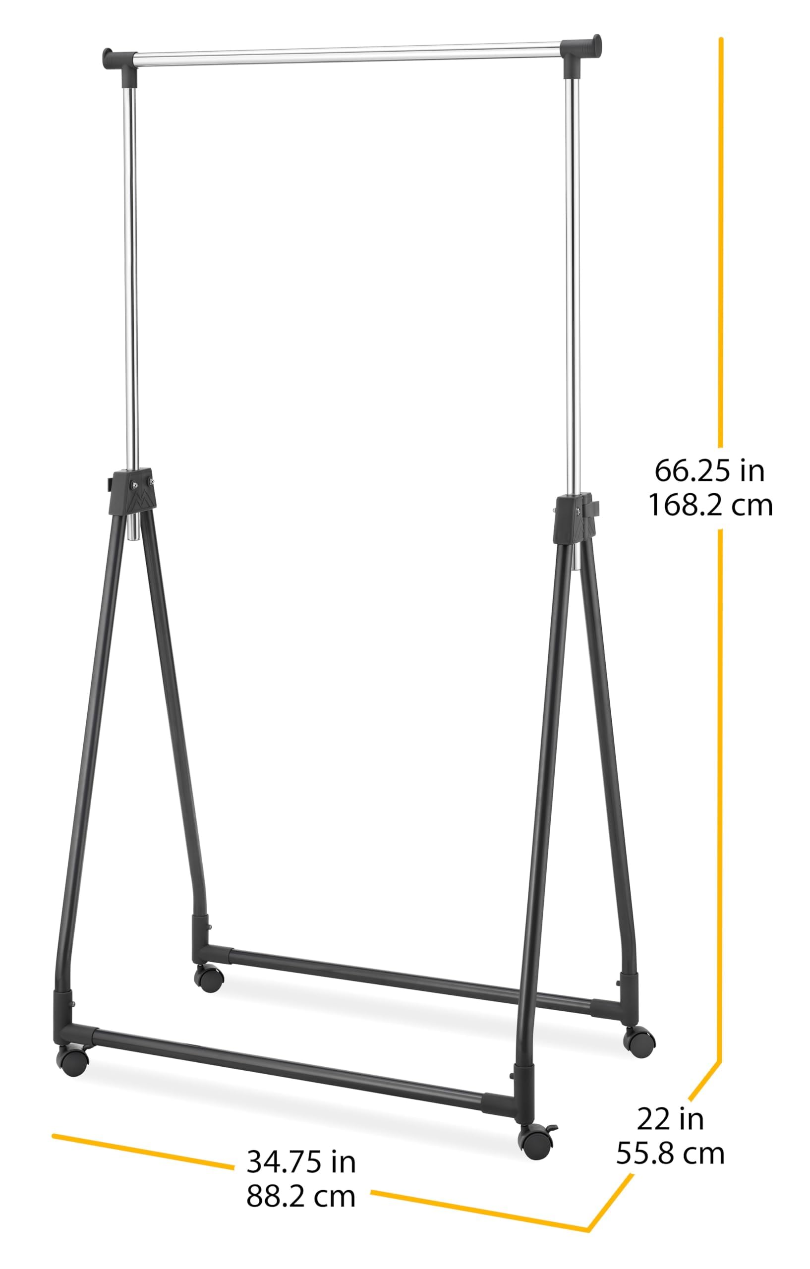 Whitmor rolling clothes rack in black for easy movement between rooms.