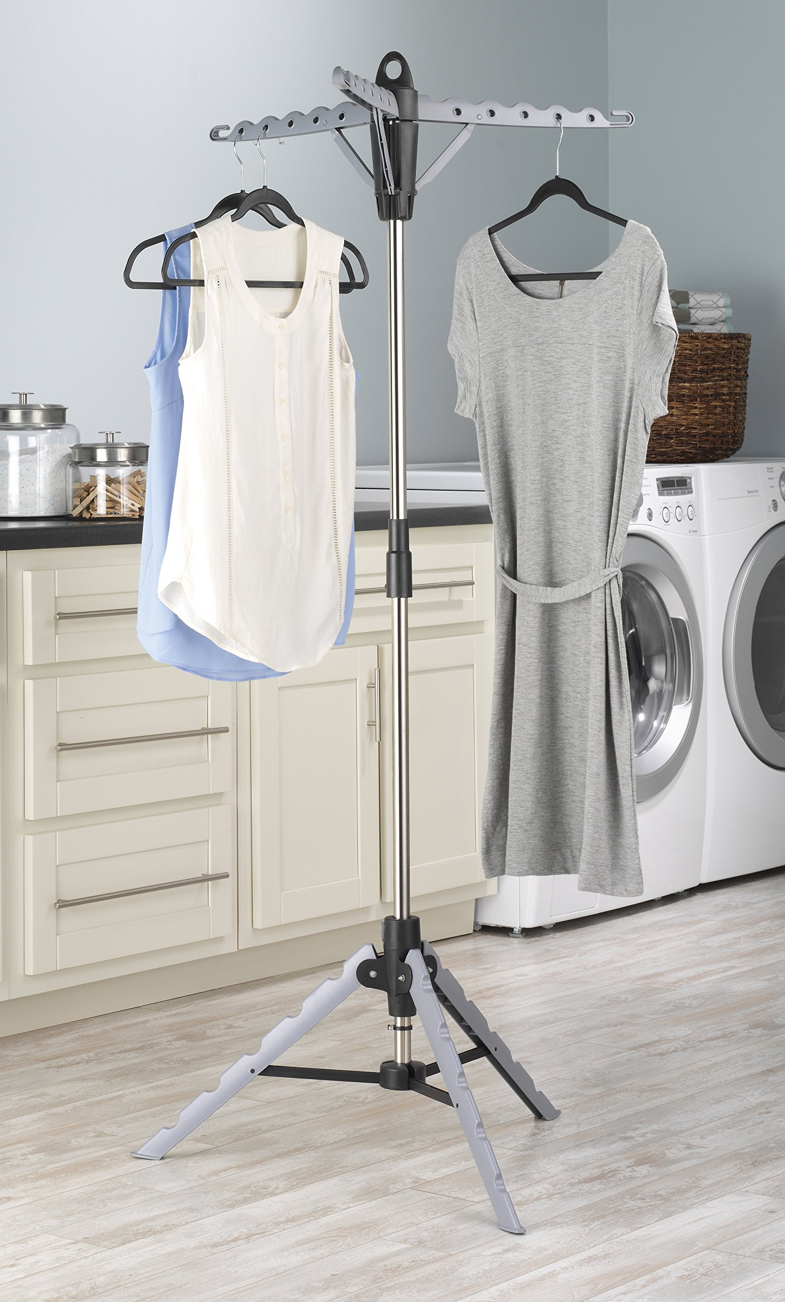 Whitmor tripod garment rack in use for efficient air-drying of clothes.