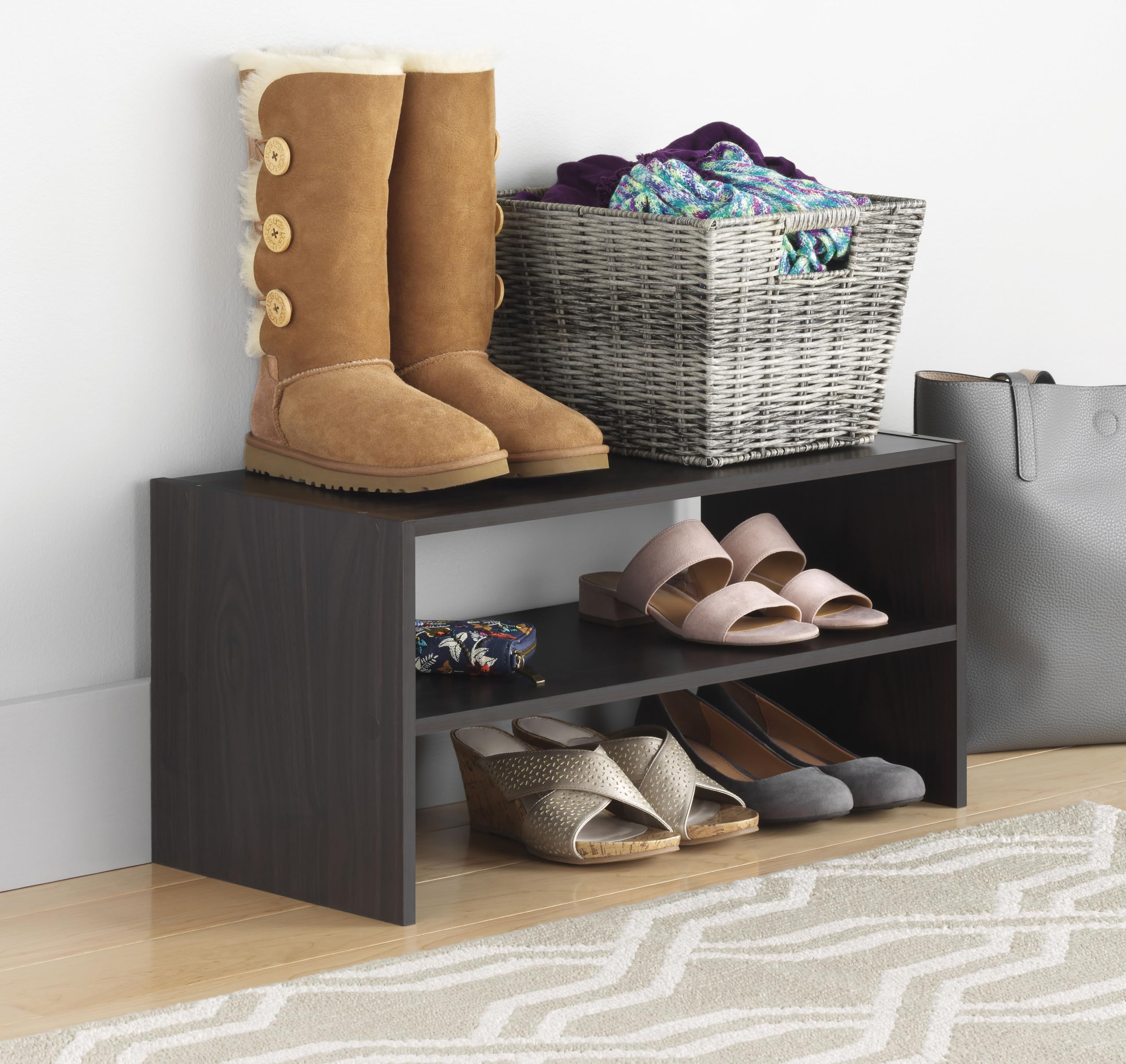 Whitmor wood stackable 2-shelf shoe rack front view stores nine pairs neatly.