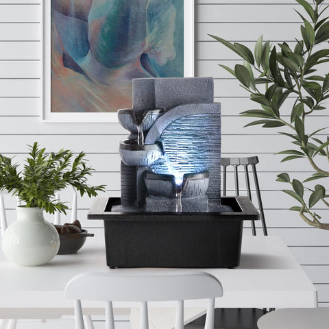 WICHEMI LED-lit tabletop fountain adds tranquil glow to any space.