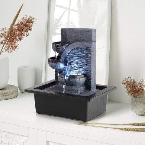 WICHEMI stone-tier fountain creates soothing indoor decor.