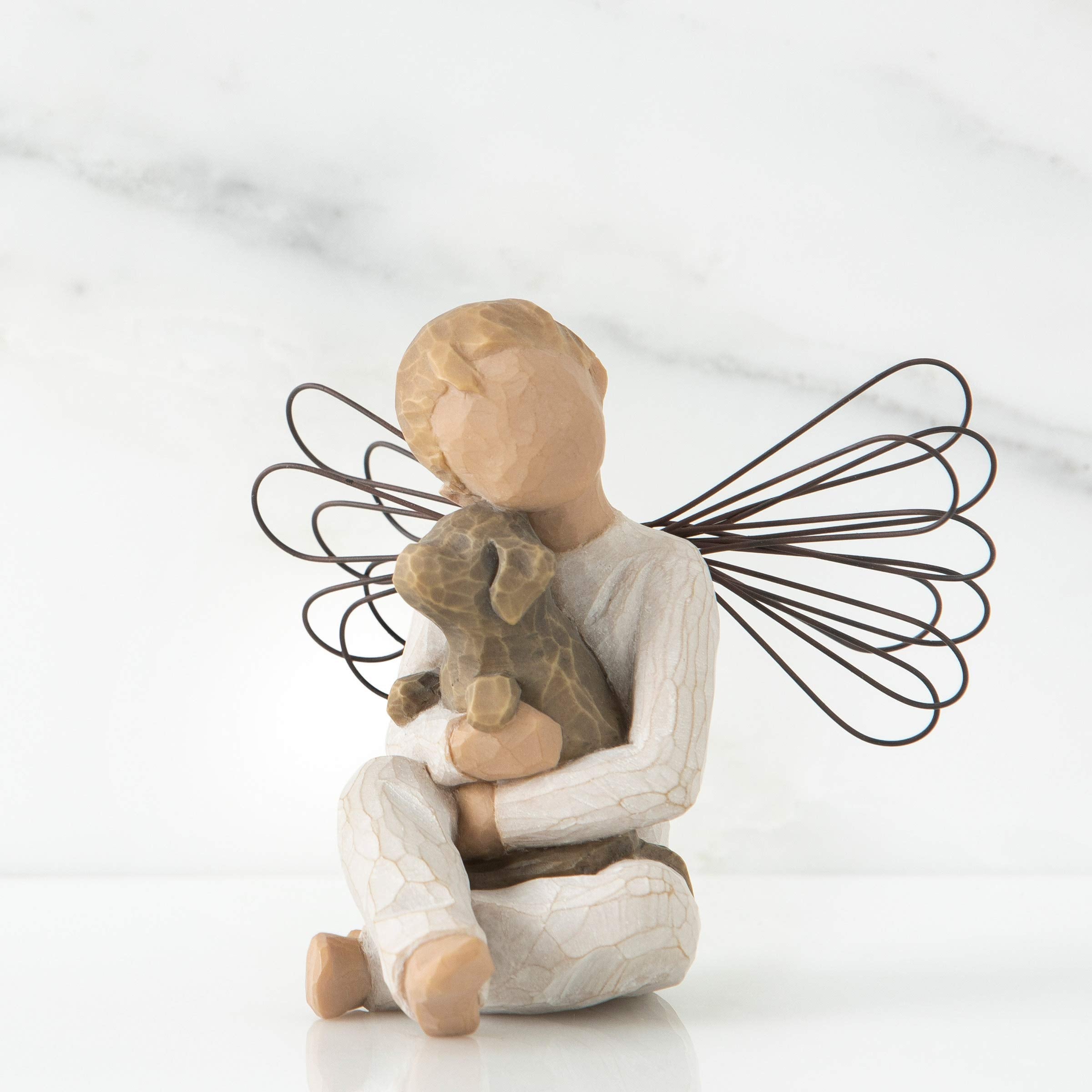 Willow Tree Angel of Comfort: hand-painted resin figure with dog in lap.