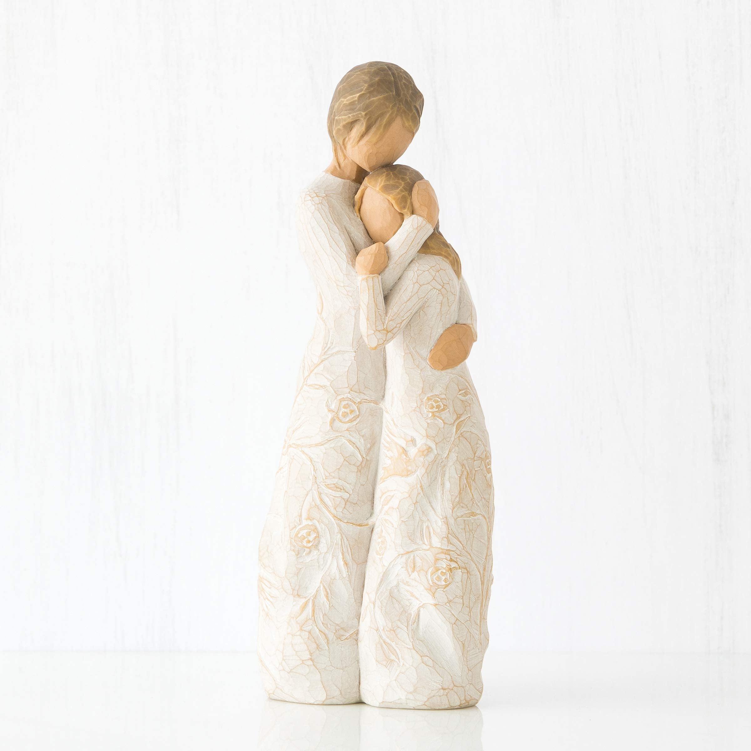 Willow Tree Close to Me: cream dresses with vines and leaves, intricate detailing.