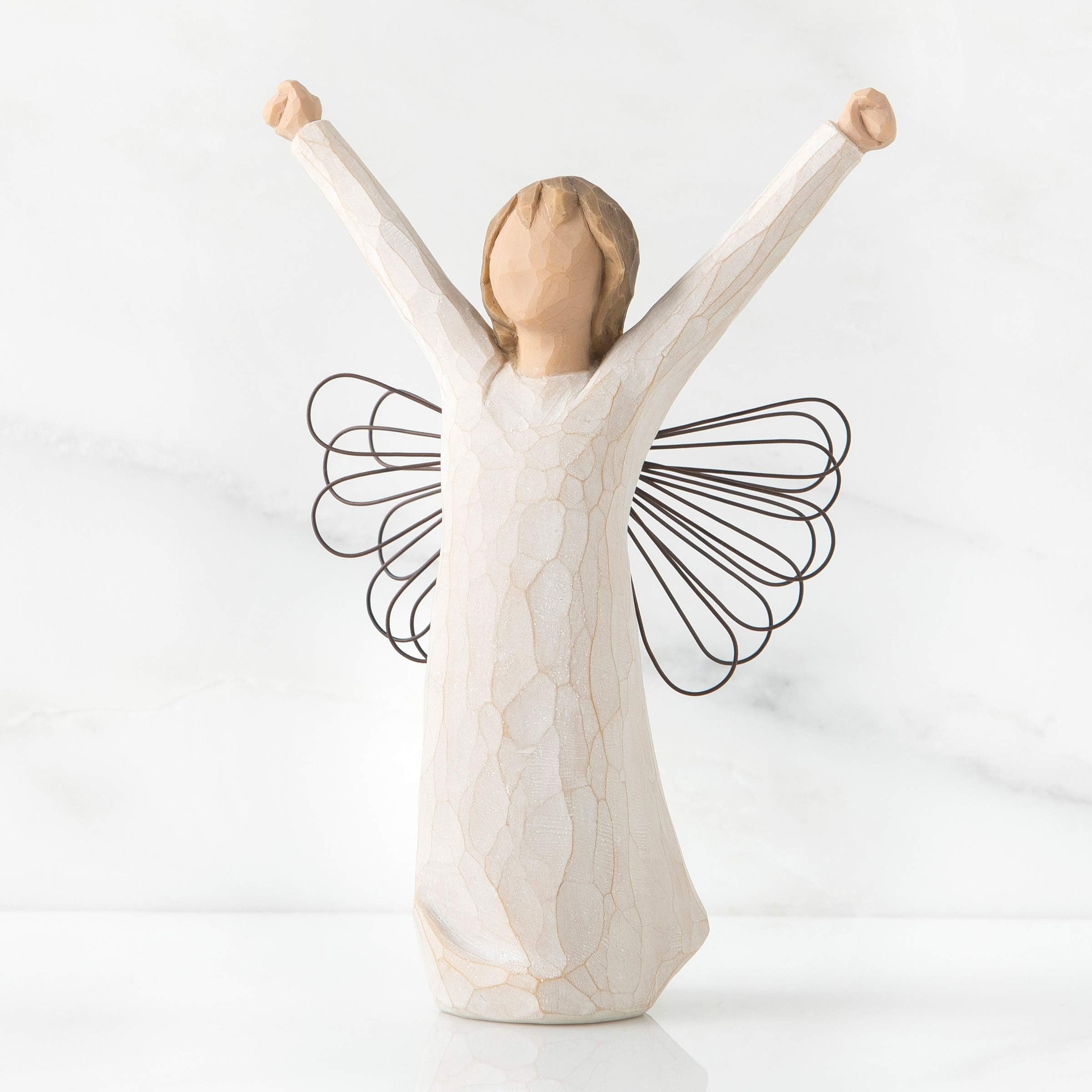 Willow Tree Courage Angel in cream dress shows delicate craftsmanship for mantel or shelf.