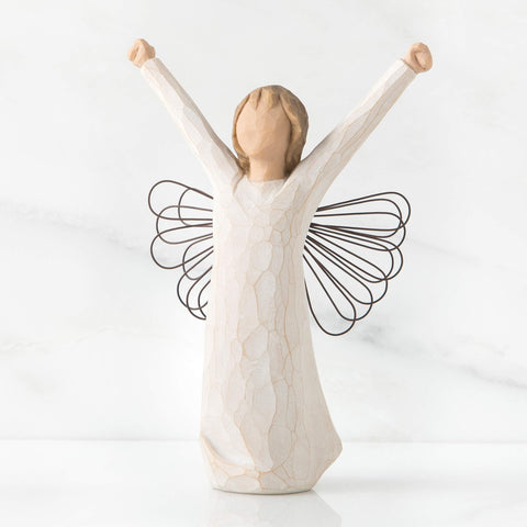 Willow Tree Courage Angel in cream dress shows delicate craftsmanship for mantel or shelf.