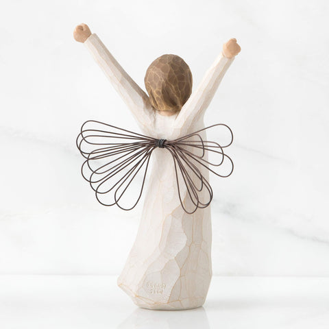 Willow Tree Courage Angel, hand-painted resin, emphasizes artisan-made charm.
