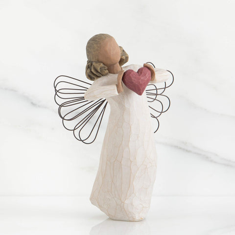 Willow Tree cream-dress angel with red heart, ready to display in home or office.