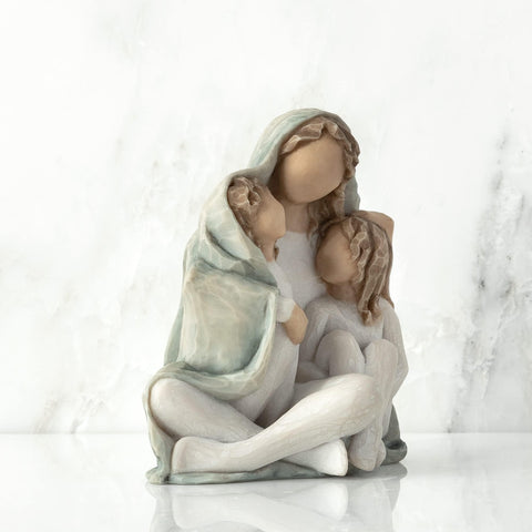 Willow Tree display-ready figurine on shelf or mantel enhances warm room decor.