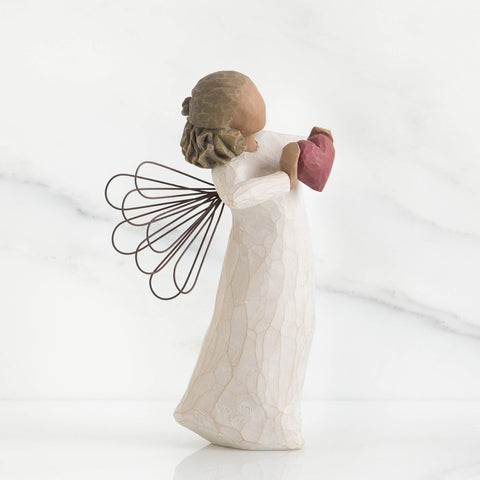 Willow Tree enclosure card reads 'You are loved', visible on the giftable figure.