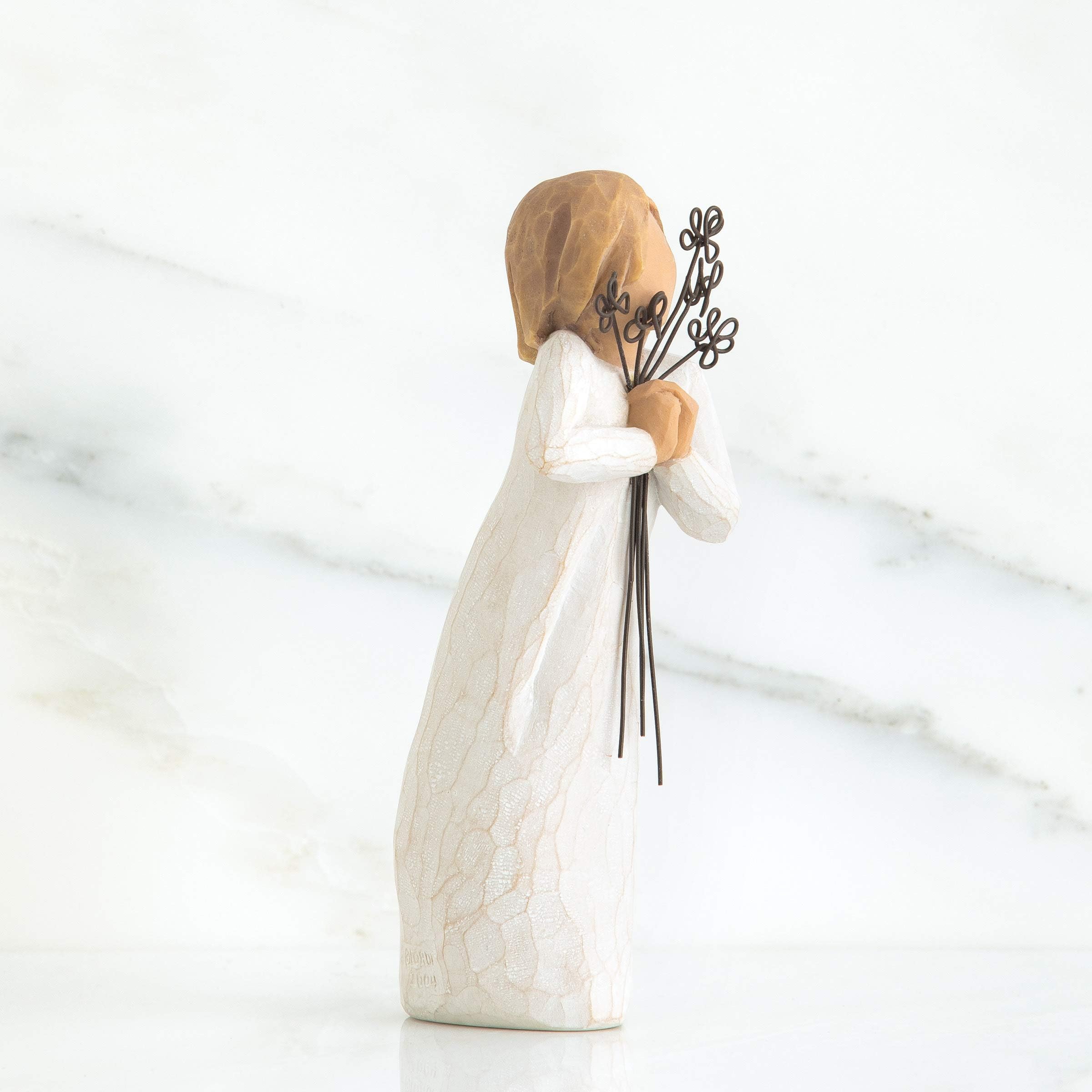 Enclosure card sentiment highlights friendship on this Willow Tree piece.