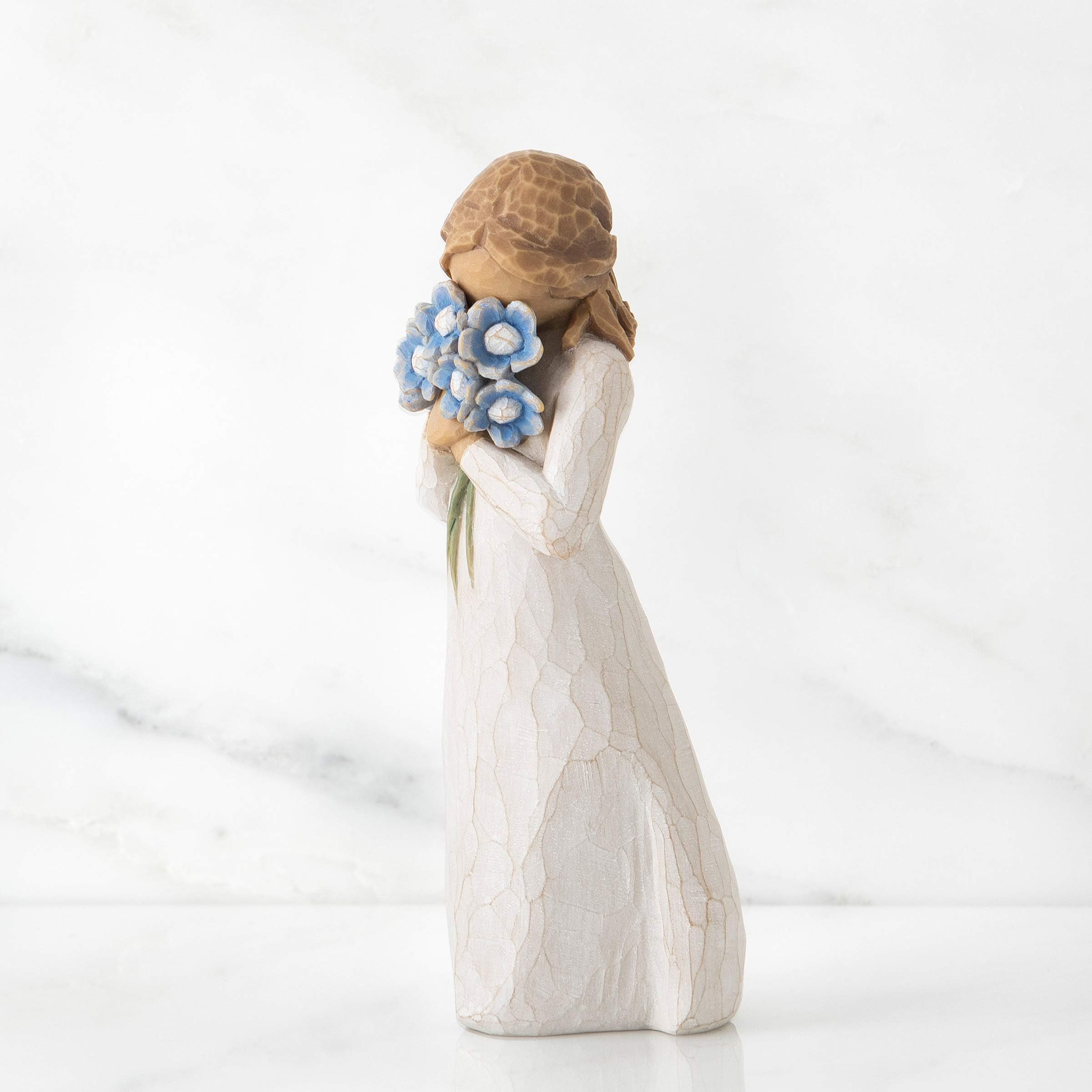 Willow Tree Forget-me-not figure bouquet focus emphasizing blue forget-me-nots.