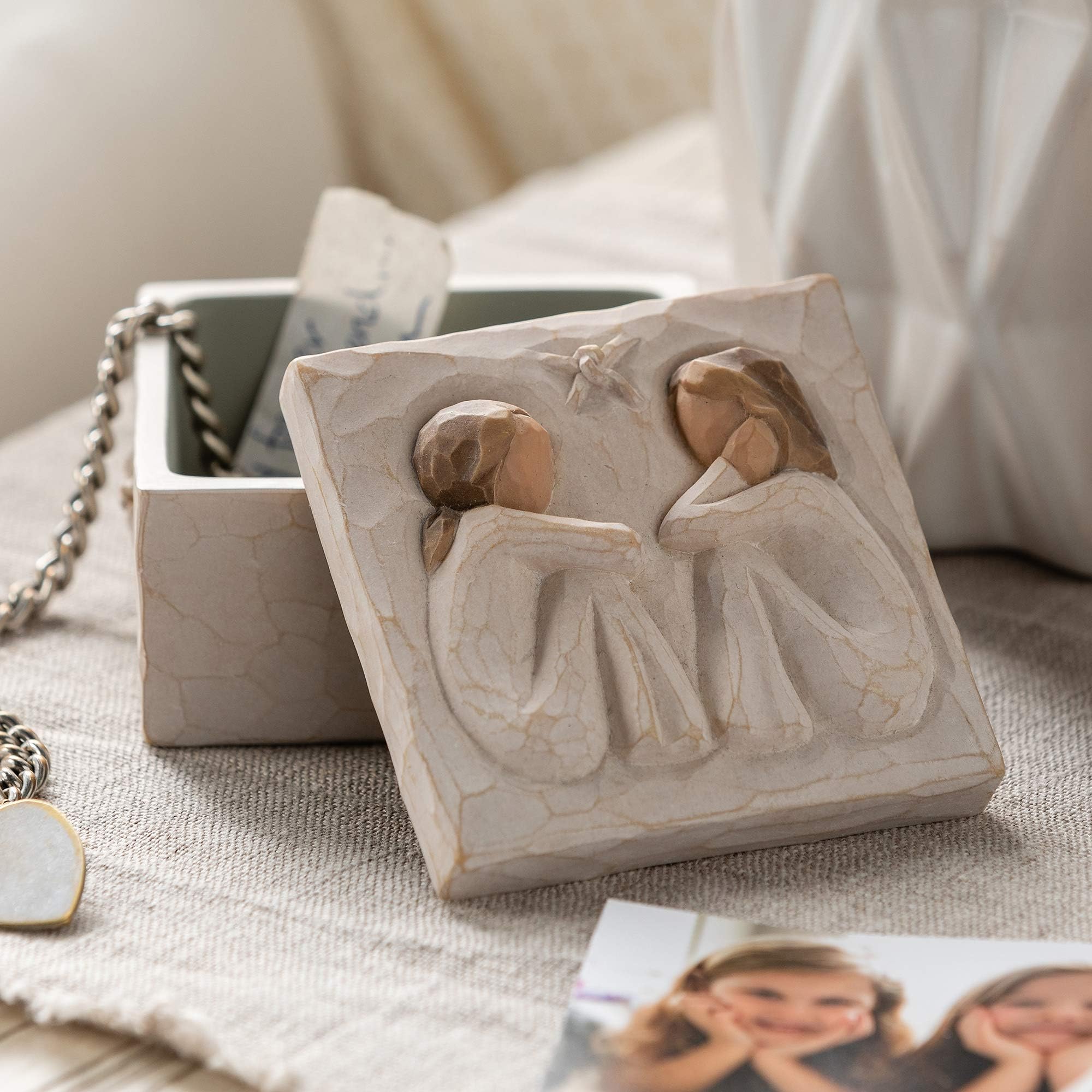 Willow Tree shelf-ready keepsake box on mantel.