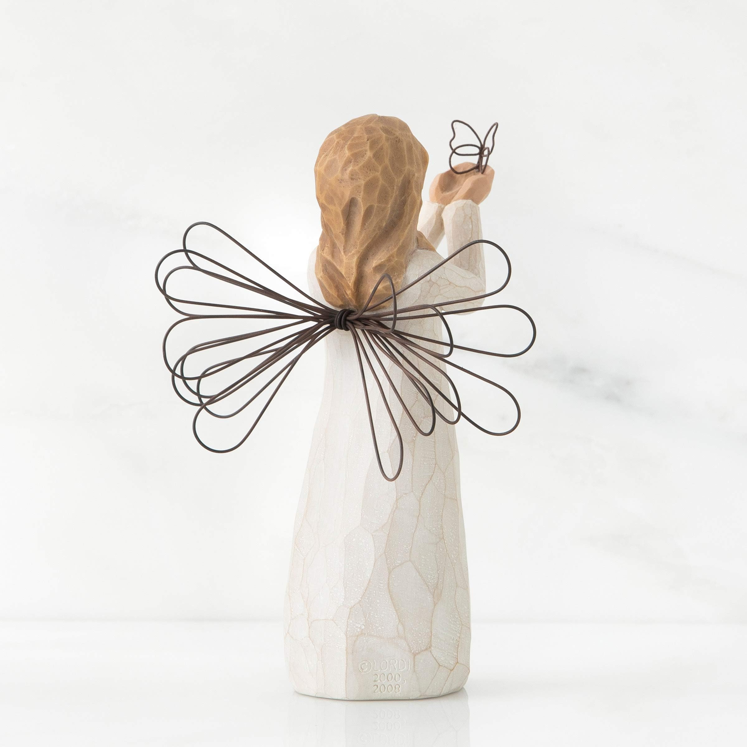 Willow Tree hand-painted resin angel, gift-ready packaging for special occasions.