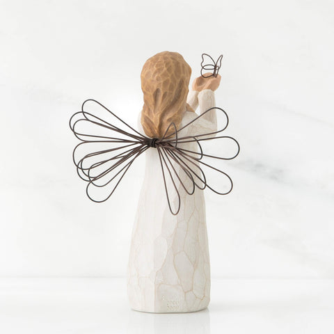 Willow Tree hand-painted resin angel, gift-ready packaging for special occasions.