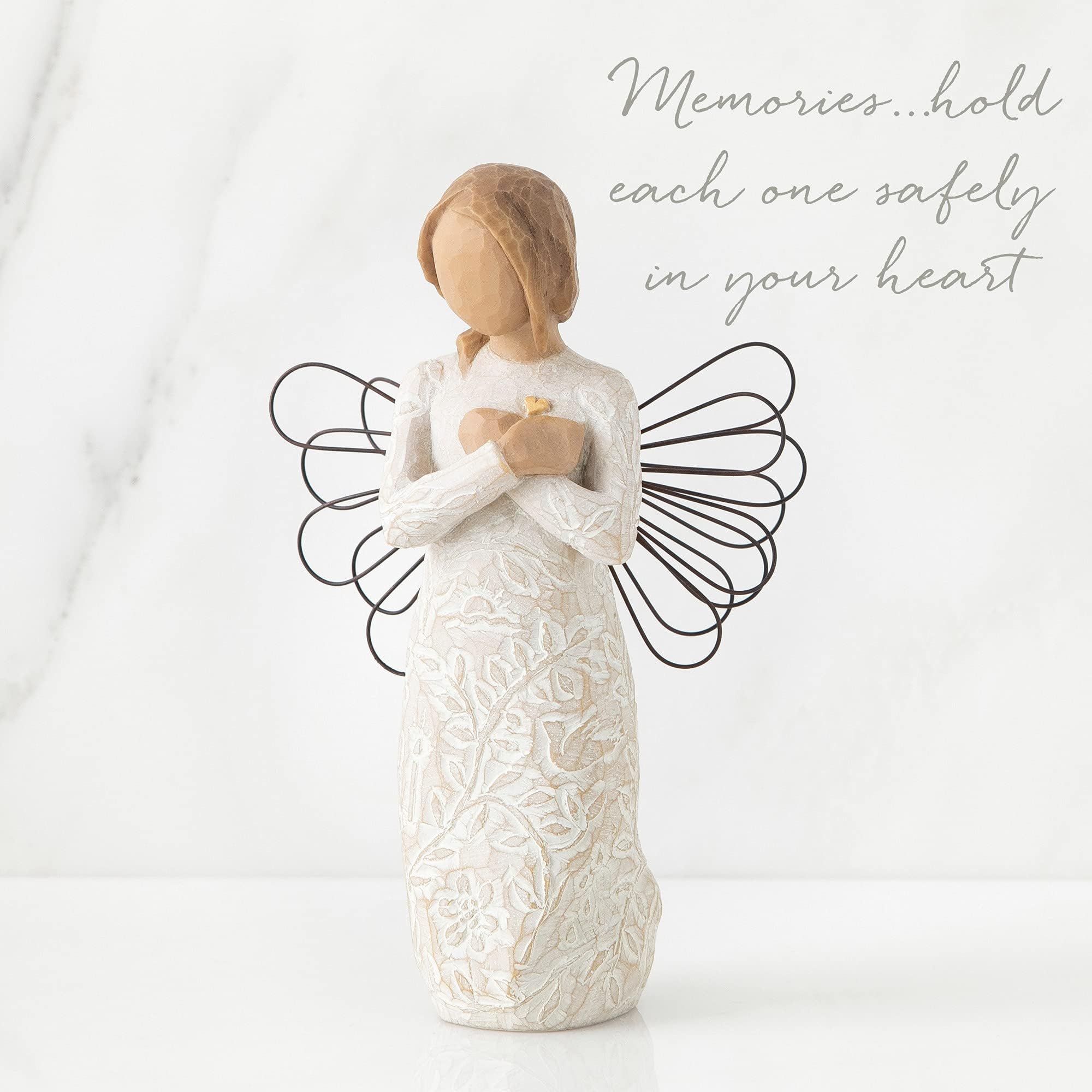 Gold leaf heart detail on Willow Tree angel adds warmth and meaning.