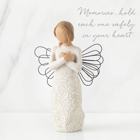 Gold leaf heart detail on Willow Tree angel adds warmth and meaning.