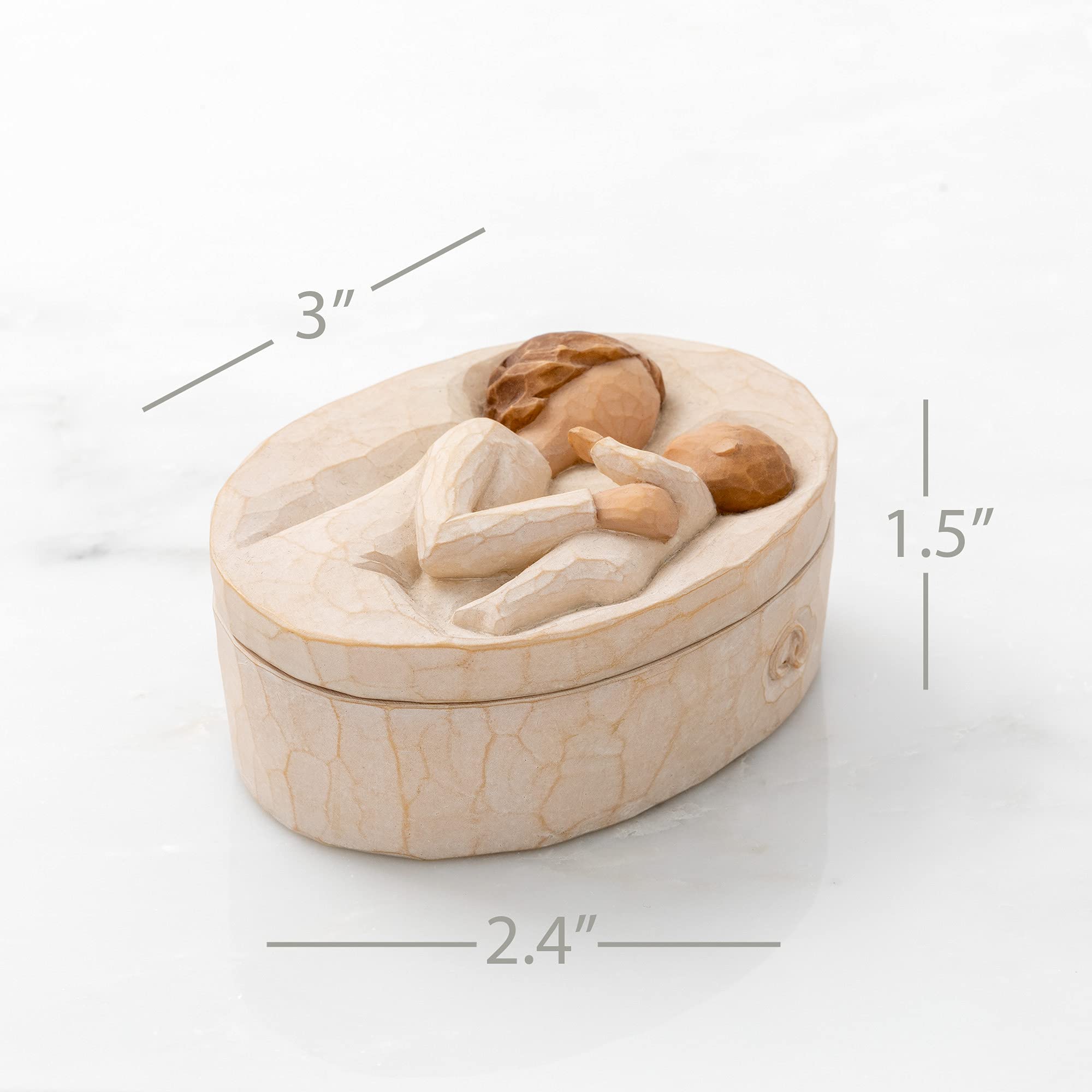 Willow Tree Grandmother cream-dress carving, elegant display on a shelf.