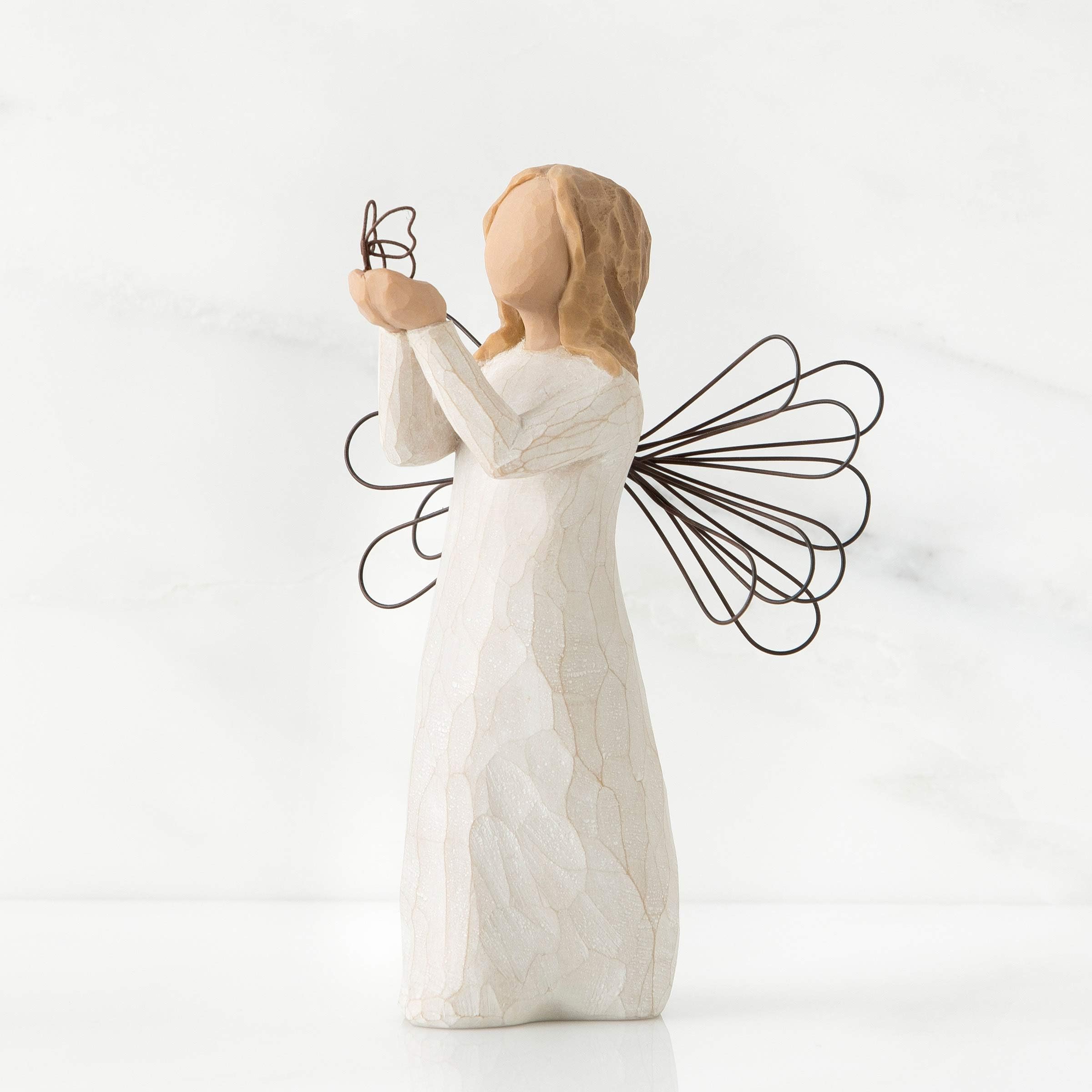 Willow Tree hand-painted angel with butterfly, perfect for graduation gift display.