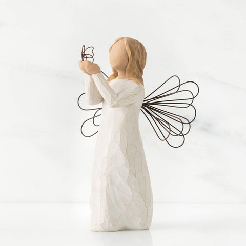 Willow Tree hand-painted angel with butterfly, perfect for graduation gift display.