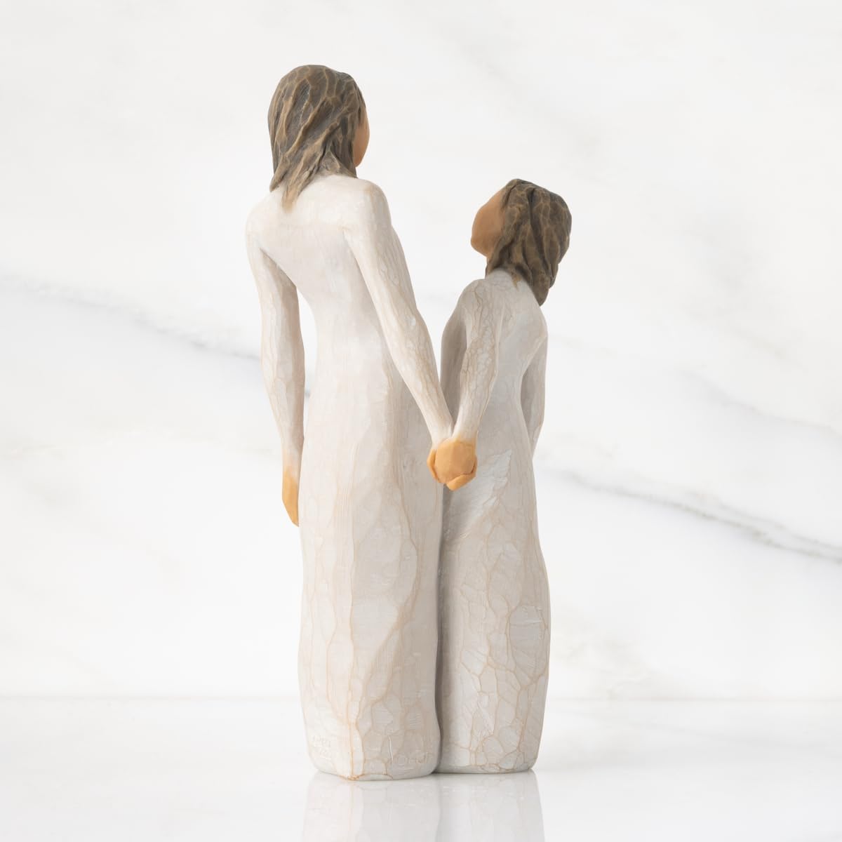 Willow Tree hand-painted resin figure highlights craftsmanship and home display appeal