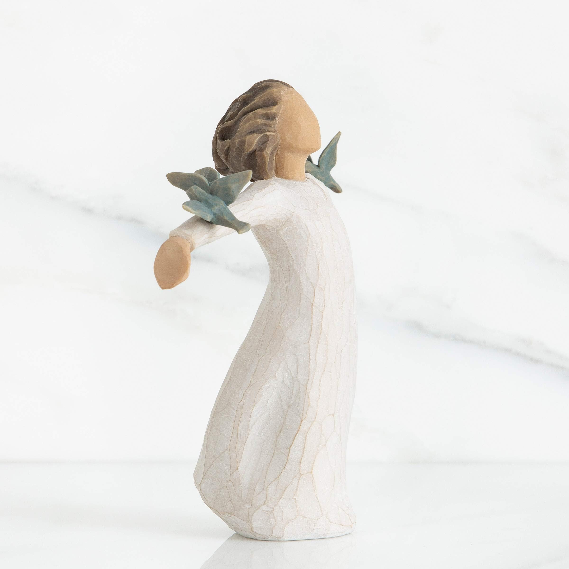 Willow Tree Happiness hand-painted detail emphasizes craftsmanship and warmth.