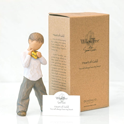 Willow Tree Heart of Gold figure display-ready on shelf.