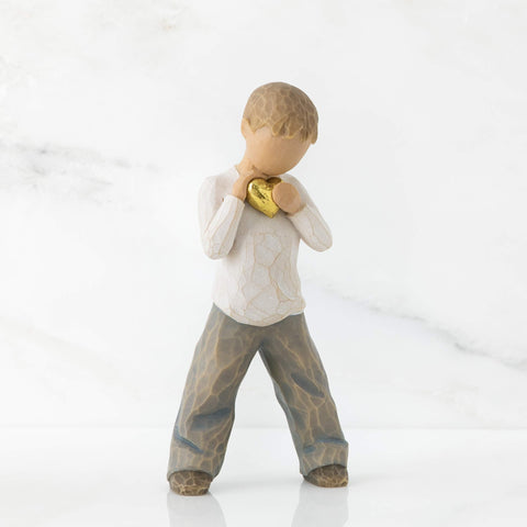 Willow Tree Heart of Gold figure holding gold-leaf heart, ideal gift.