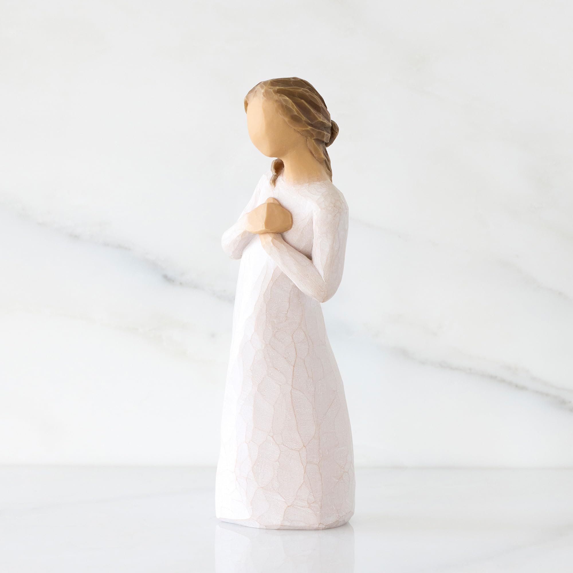 Willow Tree Here for You hands-to-heart pose conveys gentle empathy.