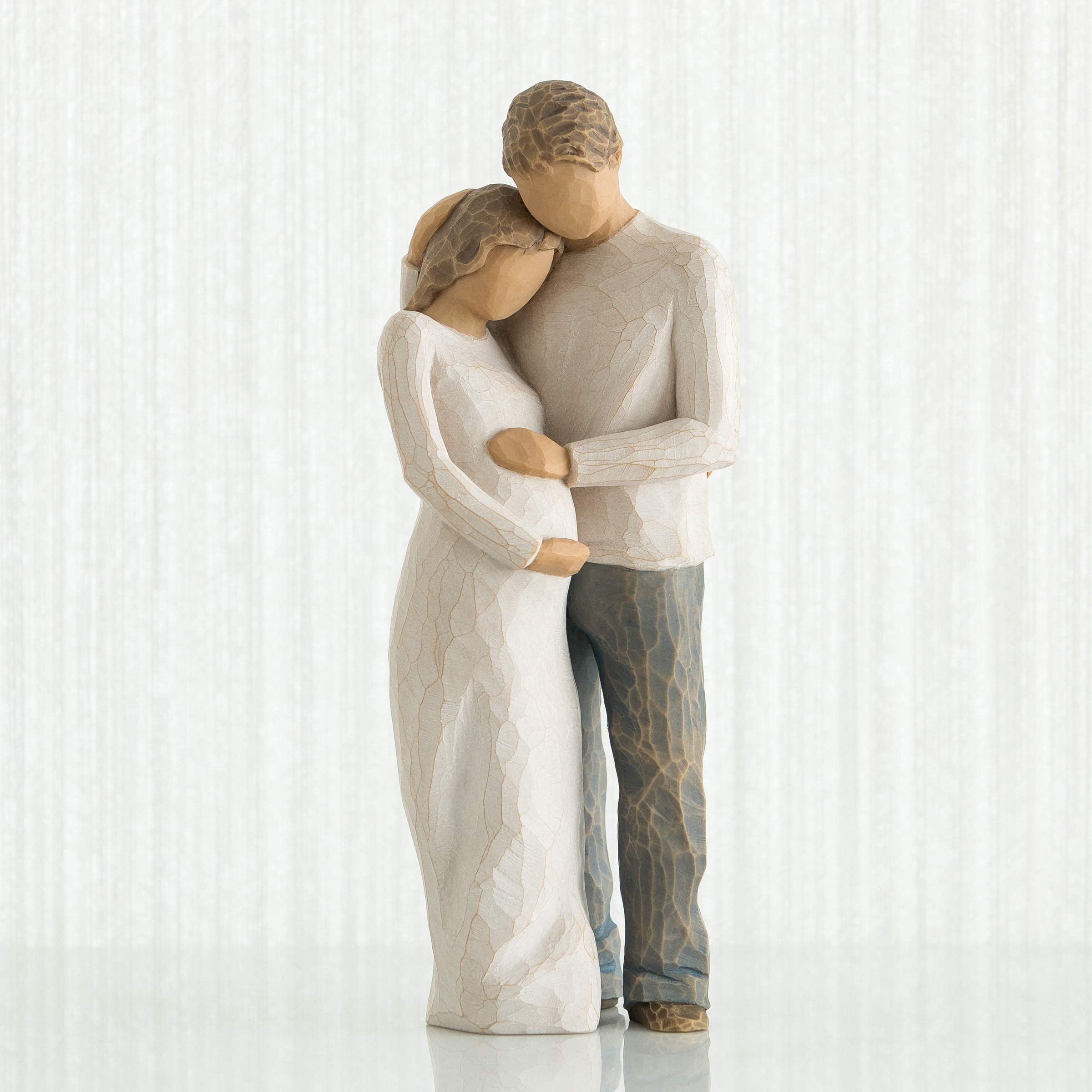 Willow Tree pregnant woman in cream dress detail, evokes new beginnings in home decor