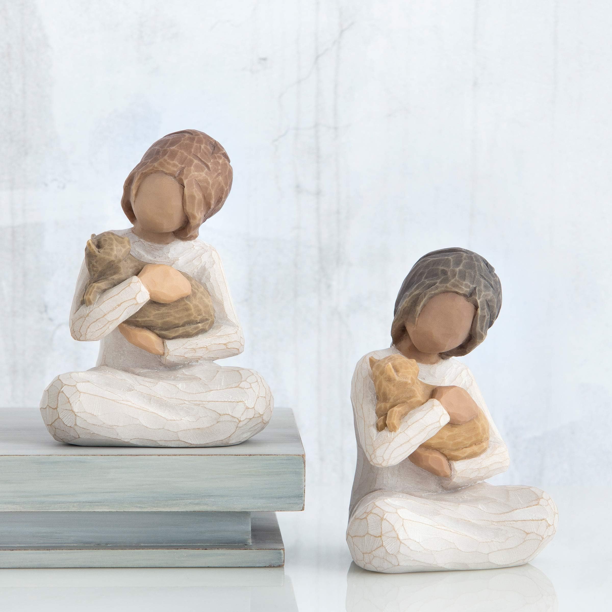 Dust with a soft brush to preserve the hand-painted finish.