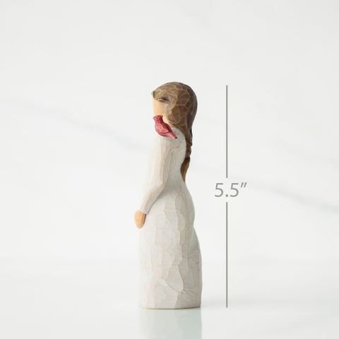 Willow Tree Messenger cream-dress figure with cardinal; a comforting keepsake for distant loved ones.