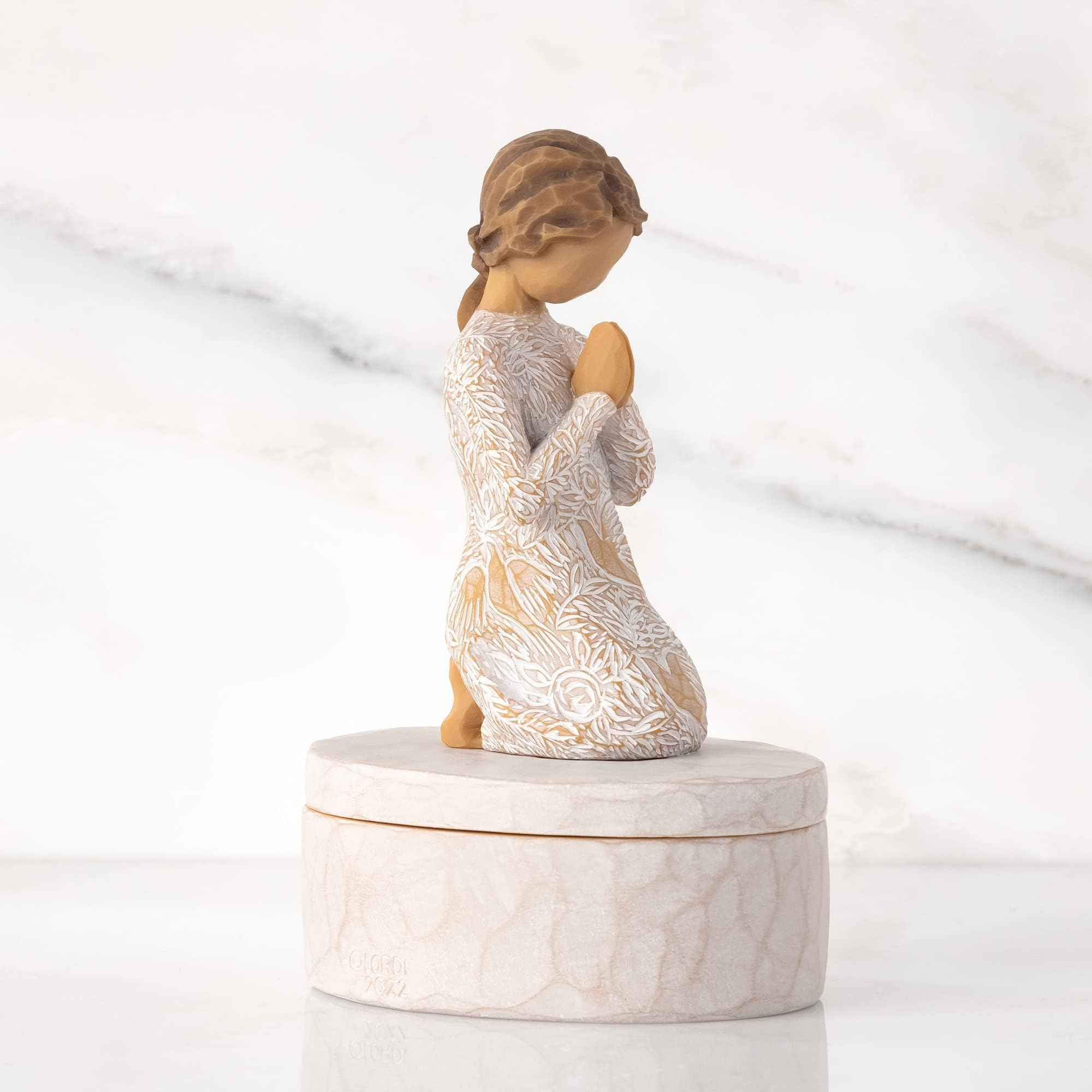 Hand-painted finish on Willow Tree Prayer of Peace keepsake box lid figure.