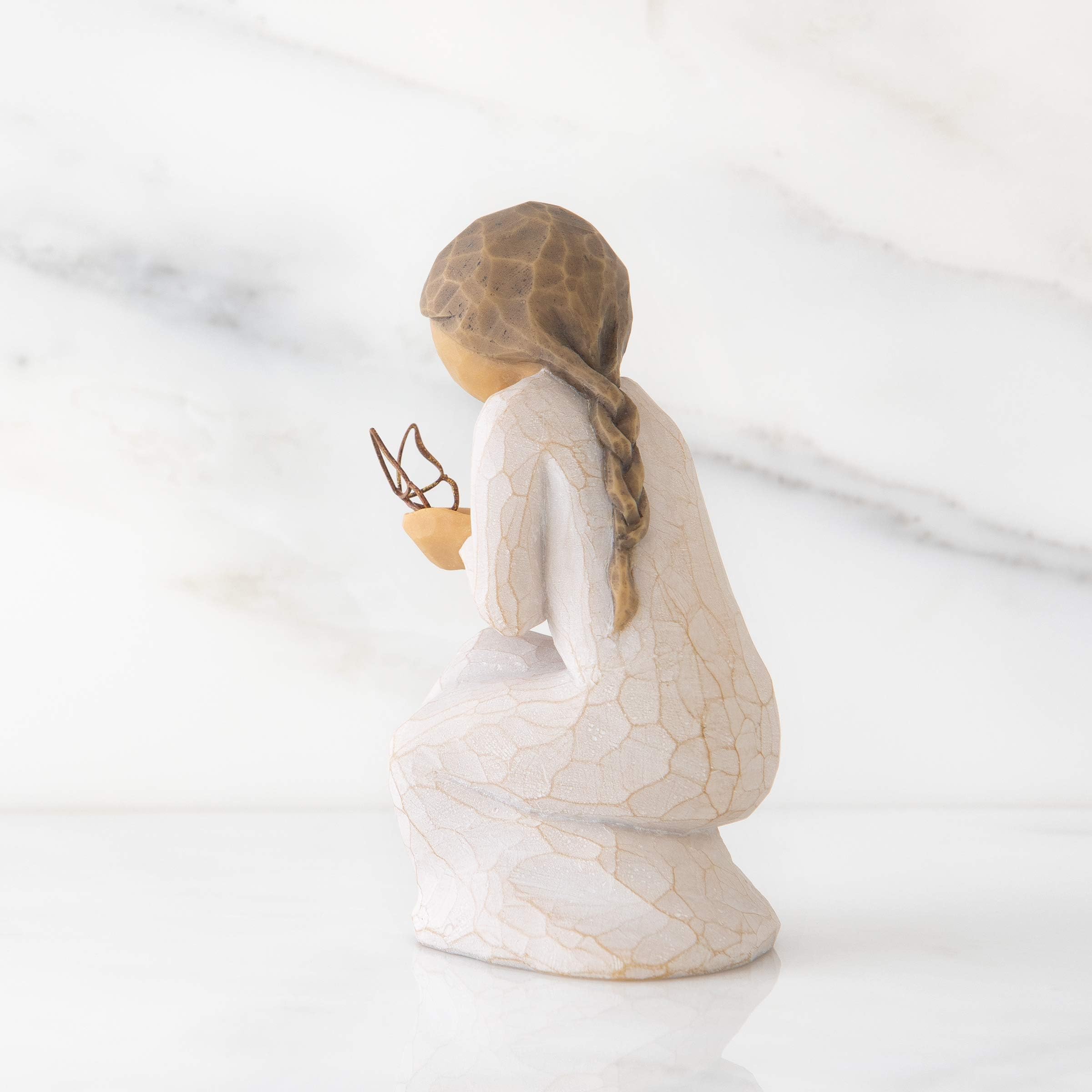 Willow Tree Quiet Wonder sculpture with gold leaf butterfly, elegant display