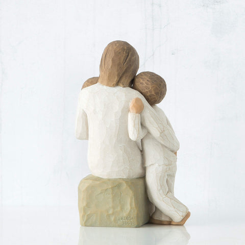 Willow Tree Quietly arm holding toddler highlights nurturing moment