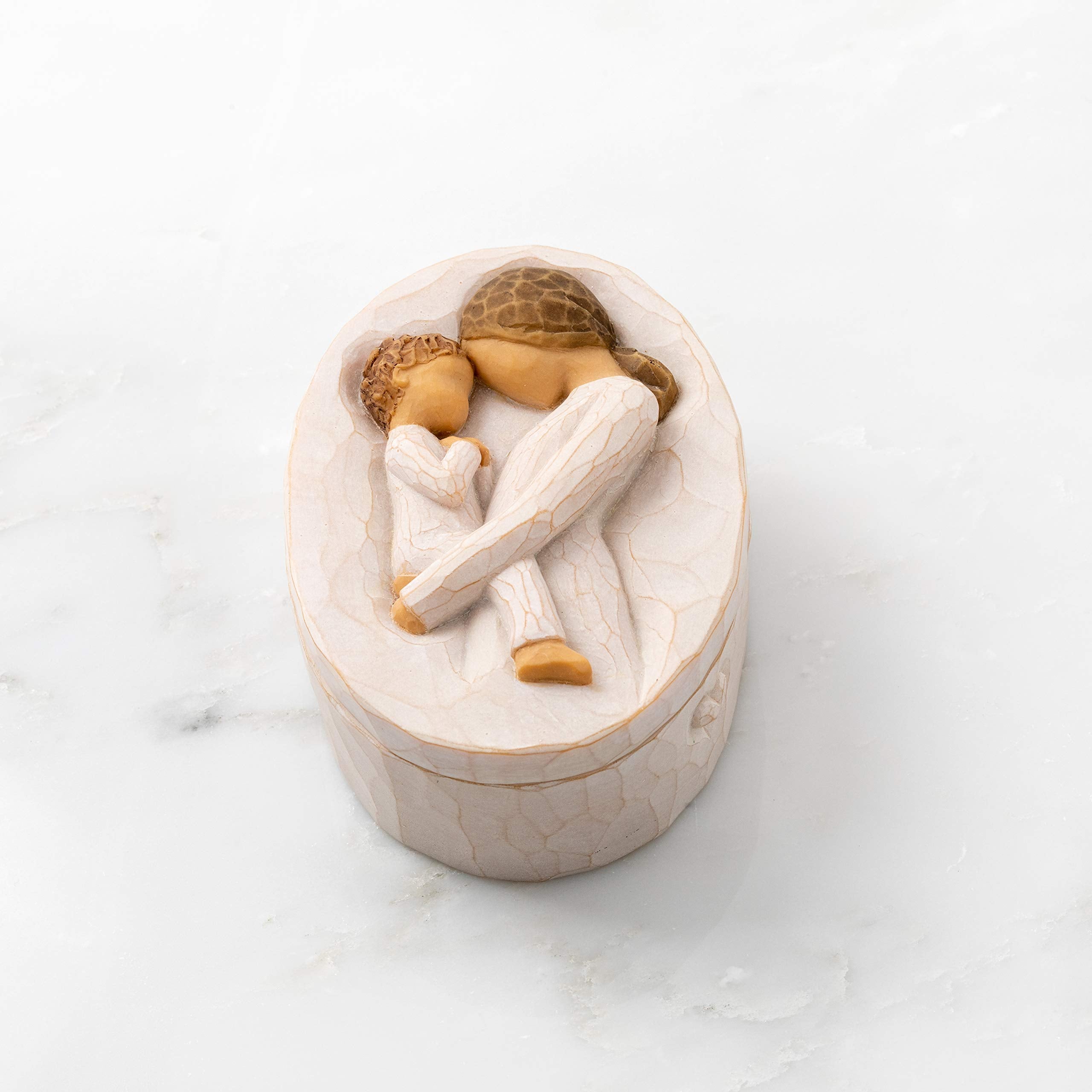 Willow Tree Tenderness inner lid reveals a hidden message of love when opened.