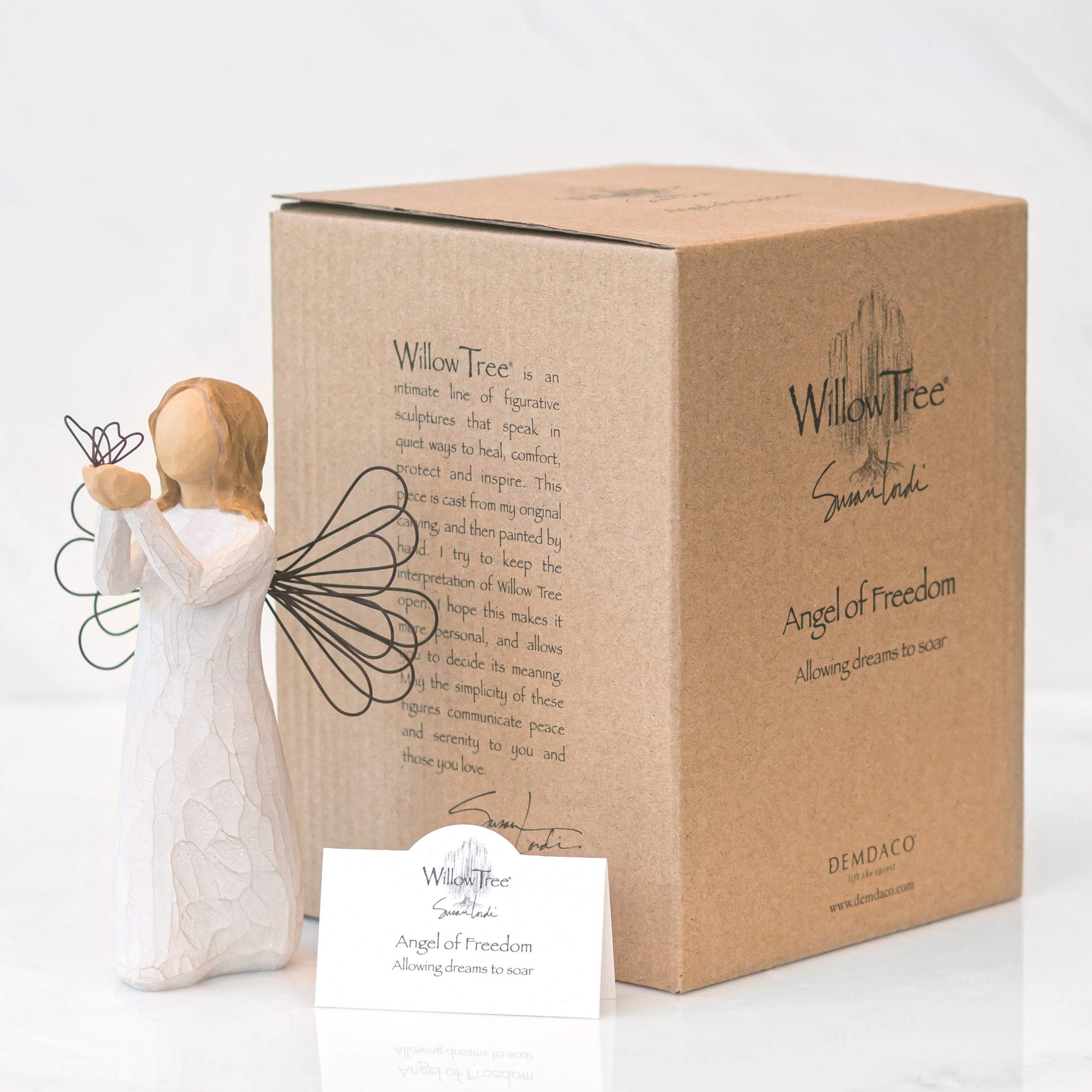 Willow Tree angel with wire butterfly and wings, elegant home decor detail.