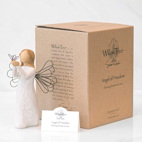 Willow Tree angel with wire butterfly and wings, elegant home decor detail.