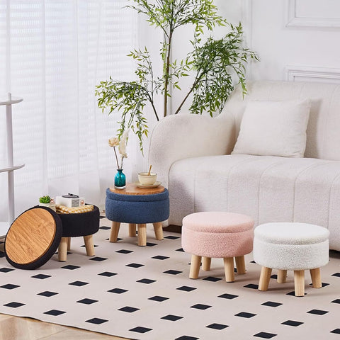 Wimarsbon living room setup with cream ottoman as seating