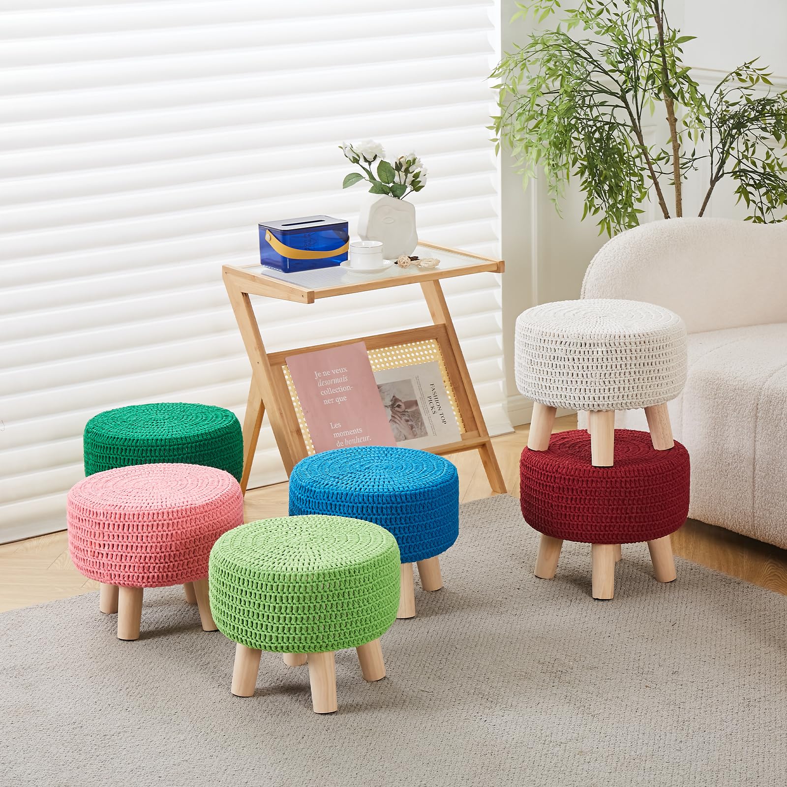 Wimarsbon pouf ottoman in living room setting as a footrest.
