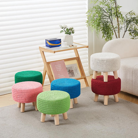 Wimarsbon pouf ottoman in living room setting as a footrest.