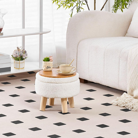 Wimarsbon round footstool with wood legs complements cozy interiors